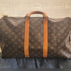 Pre-owned Louis Vuitton Monogram Duffel Bag in Brown and Tan